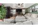 Comfortable living room showcases brick fireplace, built-in cabinets, and neutral tones at 2149 E Hermosa Vista Dr, Mesa, AZ 85213