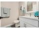 Well-lit bathroom with a modern vanity, stylish mirror, and coordinated decor at 220 N 22Nd Pl # 1022, Mesa, AZ 85213