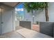 Private patio with a secure gate, offering a cozy outdoor space at 220 N 22Nd Pl # 1022, Mesa, AZ 85213