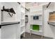 Spacious walk-in closet featuring custom shelving and ample storage for an organized wardrobe at 220 N 22Nd Pl # 1022, Mesa, AZ 85213