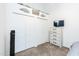 A bedroom featuring a dresser with a mounted TV and closet with double doors at 2301 E University Dr # 341, Mesa, AZ 85213
