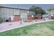 Townhome exteriors with well-maintained landscaping, including a dog waste station at 2301 E University Dr # 341, Mesa, AZ 85213