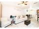 Cozy living room featuring vinyl flooring, sofa, and natural light, creating a warm atmosphere at 2301 E University Dr # 341, Mesa, AZ 85213