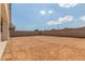 View of the backyard with block fence at 25332 N 133Rd Ave, Peoria, AZ 85383
