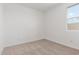 Bright bedroom with natural lighting from the window and neutral carpeting at 25332 N 133Rd Ave, Peoria, AZ 85383