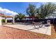 Large backyard featuring gravel and concrete areas, covered patio, pergola and grill at 2635 W Atlanta Ave, Phoenix, AZ 85041