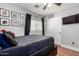 The bedroom features wood floors and a closet with sliding doors at 2635 W Atlanta Ave, Phoenix, AZ 85041