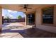Extended covered patio with ceiling fan and ample space for outdoor enjoyment at 2635 W Atlanta Ave, Phoenix, AZ 85041