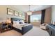 Serene bedroom with decorative lighting and scenic views at 26355 N 79Th Dr, Peoria, AZ 85383
