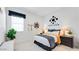 Cozy bedroom with stylish decor, ample natural light, and modern furnishings for a comfortable living space at 26355 N 79Th Dr, Peoria, AZ 85383