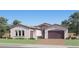 Beautiful single-story home showcasing a neutral color palette, well-manicured lawn, and a large two-car garage at 26355 N 79Th Dr, Peoria, AZ 85383