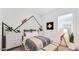 Modern bedroom with stylish accents, unique wall decor, and plenty of natural light at 26391 N 79Th Dr, Peoria, AZ 85383