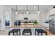 Spacious kitchen with a large island, stainless steel appliances, and pendant lighting at 26391 N 79Th Dr, Peoria, AZ 85383