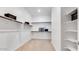 Spacious walk-in closet with ample shelving and hanging space for organized storage at 26391 N 79Th Dr, Peoria, AZ 85383