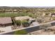 Beautiful aerial view of the home, situated on a golf course in a desert community at 3045 W Feather Sound Dr, Phoenix, AZ 85086