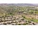 Expansive aerial view of desert community with stunning mountain backdrop and Anthem Community Center amenities at 3045 W Feather Sound Dr, Phoenix, AZ 85086