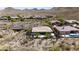 Beautiful aerial view of the home with an extended back patio in a desert community at 3045 W Feather Sound Dr, Phoenix, AZ 85086