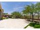 Charming back patio with desert landscaping and outdoor seating, perfect for enjoying the Arizona sun at 3045 W Feather Sound Dr, Phoenix, AZ 85086