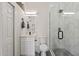 Modern bathroom featuring a glass-enclosed shower with marble-style tiling and sleek fixtures at 3045 W Feather Sound Dr, Phoenix, AZ 85086