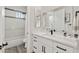 Bright bathroom with a modern vanity and a shower-tub combination at 3045 W Feather Sound Dr, Phoenix, AZ 85086