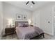 Comfortable bedroom featuring a ceiling fan, matching nightstands and calm design at 3045 W Feather Sound Dr, Phoenix, AZ 85086