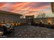 Relaxing outdoor courtyard with stylish seating, lush plants, stone accents and brick pavers at 3045 W Feather Sound Dr, Phoenix, AZ 85086