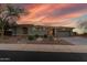 Beautiful home exterior featuring desert landscaping, a paved driveway, and a two car garage at 3045 W Feather Sound Dr, Phoenix, AZ 85086