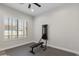 Minimalist home gym featuring neutral colors and natural light through the window at 3045 W Feather Sound Dr, Phoenix, AZ 85086