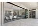 Bright living space with tile floors seamlessly connects the indoor and outdoor living areas at 3045 W Feather Sound Dr, Phoenix, AZ 85086