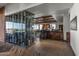 Upscale lounge area with a glass wine storage, bar, and comfortable seating at 3045 W Feather Sound Dr, Phoenix, AZ 85086