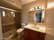 Bright bathroom with updated vanity, mirror and a shower at 3216 E Campo Bello Dr, Phoenix, AZ 85032