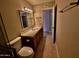 Bathroom features a vanity, a mirror and a toilet at 3216 E Campo Bello Dr, Phoenix, AZ 85032