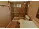 Tile and glass shower with a rainfall showerhead at 3216 E Campo Bello Dr, Phoenix, AZ 85032