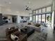 Open-concept living space with modern furniture, high ceilings, and scenic views at 3502 S Kings Ranch Rd, Gold Canyon, AZ 85118