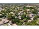 Neighborhood aerial view showing mature trees and lush landscaping throughout this charming community at 3750 E Palm St, Mesa, AZ 85215