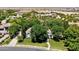 Lush, mature trees surround this single-story home with its charming front yard, in an established neighborhood at 3750 E Palm St, Mesa, AZ 85215