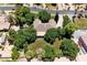 Expansive lot with mature trees surrounding this single-story home, offering ample shade and privacy at 3750 E Palm St, Mesa, AZ 85215