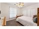Bedroom with carpet, a double bed and a window for natural light at 3750 E Palm St, Mesa, AZ 85215