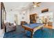 Game room featuring a pool table, built-in shelving, and comfortable seating at 3750 E Palm St, Mesa, AZ 85215