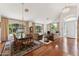 Open-concept living space with hardwood floors, lots of natural light, and neutral décor at 3750 E Palm St, Mesa, AZ 85215