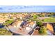 Home's aerial view showcasing a lush park nearby and neatly arranged residential area at 4049 E Arbor Ave, Mesa, AZ 85206
