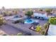 Aerial view of a spacious backyard with a pool, pergola, and desert landscaping at 4049 E Arbor Ave, Mesa, AZ 85206