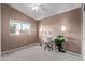 Bright bedroom with soft natural lighting, a vaulted ceiling, and neutral colors at 4049 E Arbor Ave, Mesa, AZ 85206