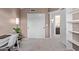 Neutral bedroom featuring a closet and a desk with access to an en-suite bathroom at 4049 E Arbor Ave, Mesa, AZ 85206