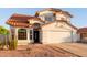 Charming two-story home featuring a terracotta tile roof, neutral stucco, and a well-maintained front yard at 4049 E Arbor Ave, Mesa, AZ 85206