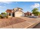 Well-maintained home showcasing a terracotta roof, neutral stucco, complemented by the neatly kept front yard at 4049 E Arbor Ave, Mesa, AZ 85206