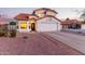 Charming home featuring a tile roof, neutral paint scheme, and two-car garage at 4049 E Arbor Ave, Mesa, AZ 85206