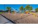 Community playground with swings and slides and climbing structures for recreation at 4049 E Arbor Ave, Mesa, AZ 85206