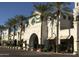 Street view of shopping center featuring a grocery store and palm trees at 4049 E Arbor Ave, Mesa, AZ 85206
