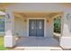 Covered front entryway featuring double doors, decorative lights, and a well-maintained walkway at 4112 N 4Th Ave, Phoenix, AZ 85013